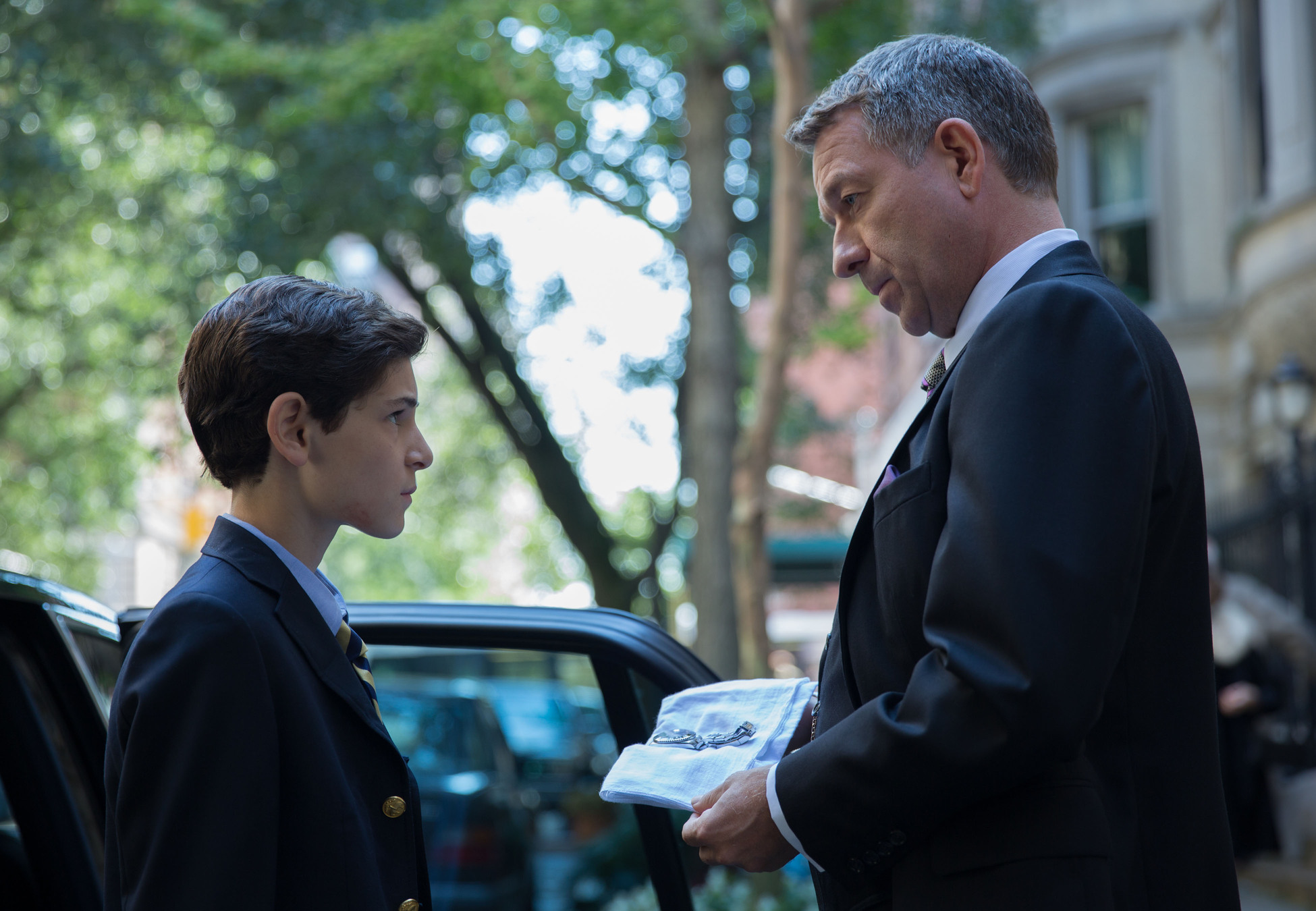 GOTHAM: Alfred (Sean Pertwee, R) presents Bruce (David Mazouz, L) with his father's watch in the "The Mask" episode of GOTHAM airing Monday, Nov. 10 (8:00-9:00 PM ET/PT) on FOX. Â©2014 Fox Broadcasting Co. Cr: Jessica Miglio/FOX
